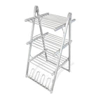 Tendedero plegable en funcionamiento secando ropa