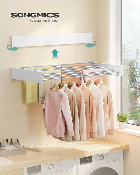Barras de aluminio del tendedero plegable en uso