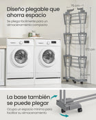 Tendedero con ropa colgada - uso interior