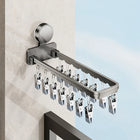 Tendedero plegable en blanco y gris