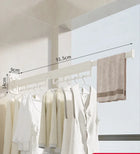 Tendedero plegable retráctil de pared - ahorro de espacio