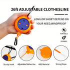 Cuerda del tendedero extendida con ropa colgada
