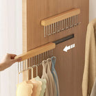 Ganchos de madera retráctiles para organizar ropa