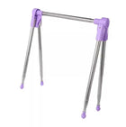 Tendedero plegable con ropa colgada