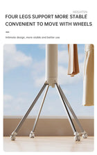 Tendedero de ropa plegable vista lateral con ropa