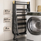 Tendedero plegable con ropa colgada en interior