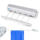 Tendedero de pared con cuerdas retráctiles extendidas