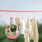 Detalle del gancho antiviento y cuerdas ajustables